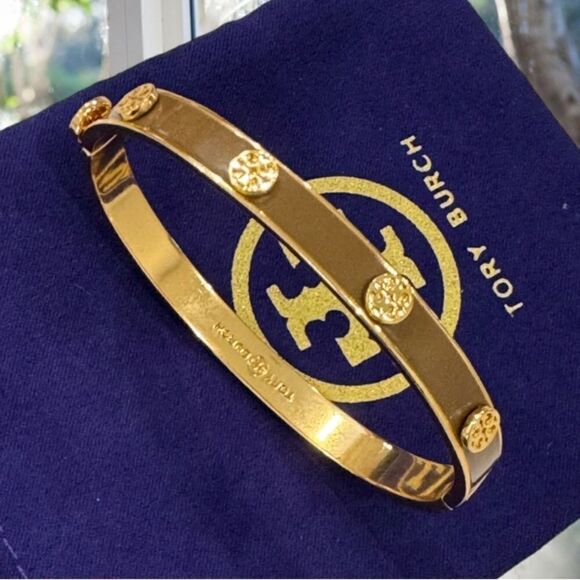 TORY BURCH KIRA GOLD LOGO BROWN ENAMEL HINGE BRACELET - Picture 1 of 4